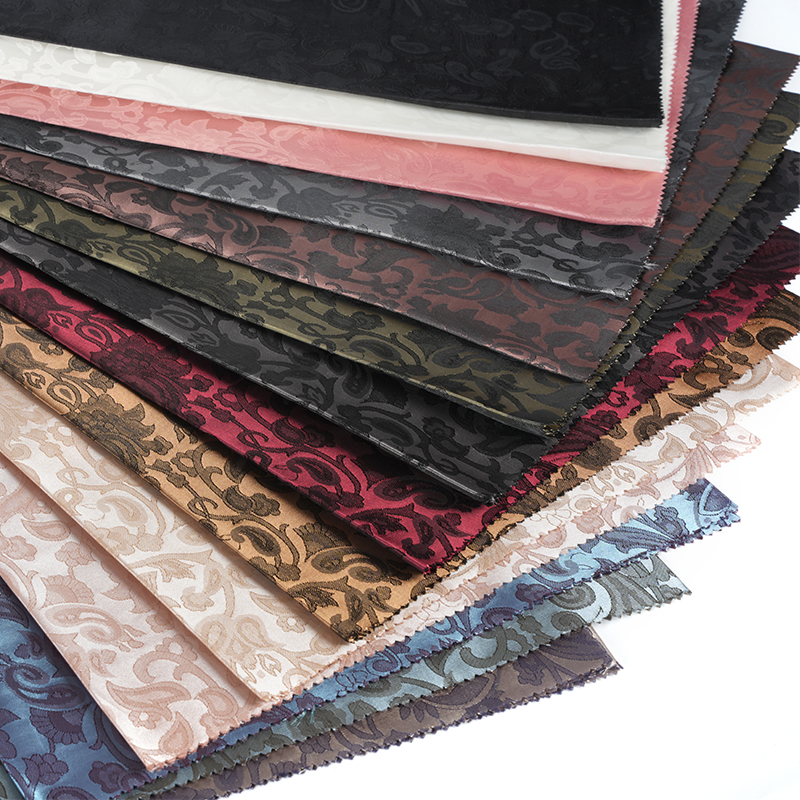 Poliester Jacquard s nazubljenim lutnjastim cvijetom